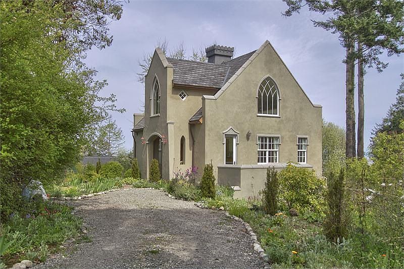 Romantic curved drive to home with room for garage/carport