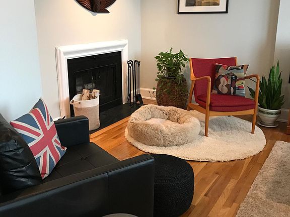 Living Room with working wood burning fireplace.