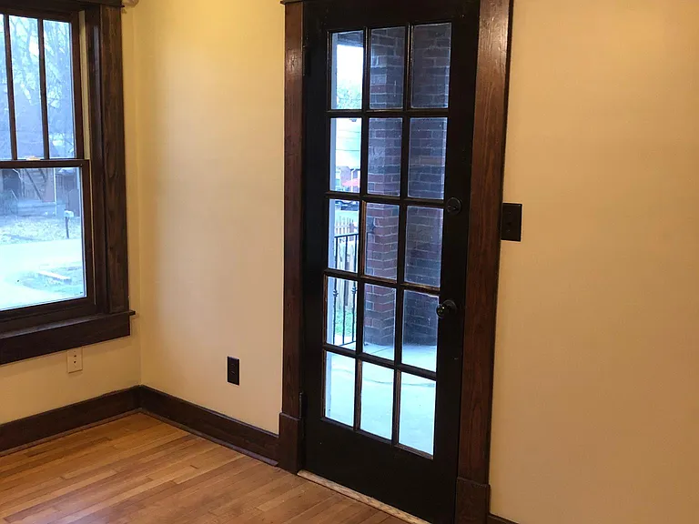 Door entering relaxing sitting porch off living room