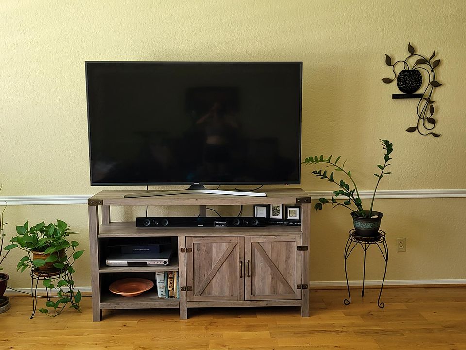 84 inch TV with Firestick, and sound bar.