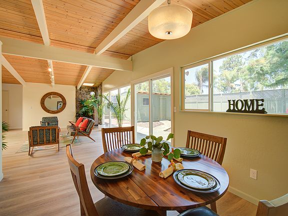 Dining area adjacent to living room.