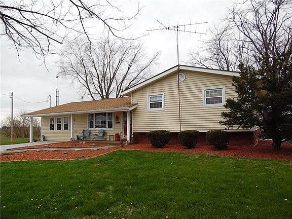 Exterior Front:  Electric service upgraded to 200 amp + all electric receptacles replaced in 2006!!  AND, interior wood trim completely replaced in 2006!!!!