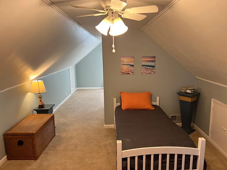 Upstairs bedroom, very spacious, one queen bed and two twin beds.