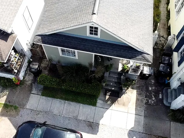 Plenty opportunities for outdoor living; the porch overlooks a lovely, landscaped front garden