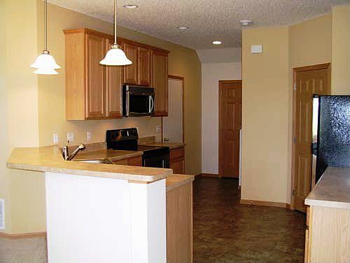 Spacious kitchen with walk-in pantry, breakfast bar