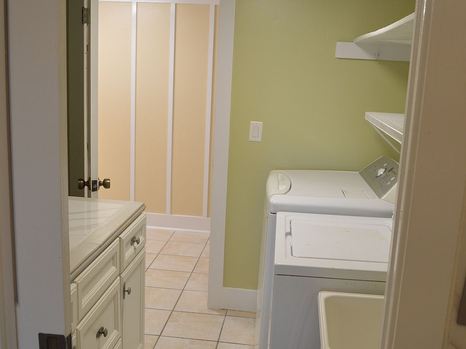 Looking into laundry room from kitchen