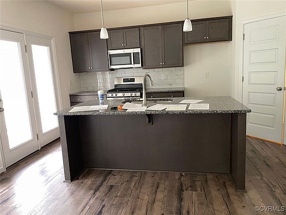 5th image of 10823 Farmstead Mill Ln #10823