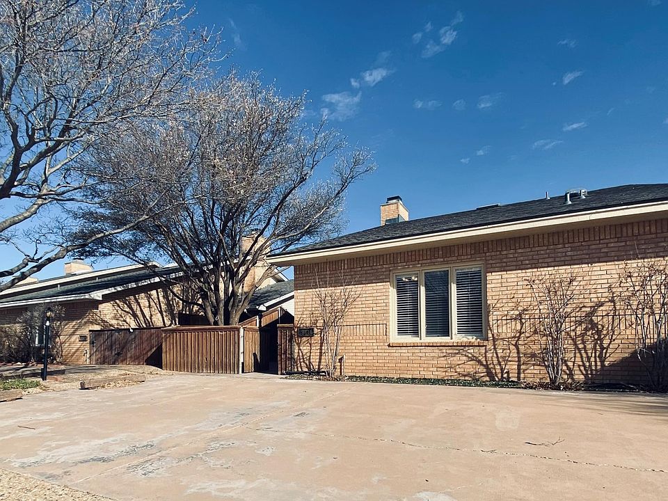 3416 96th Parking and Entry Into the Front Private Courtyard