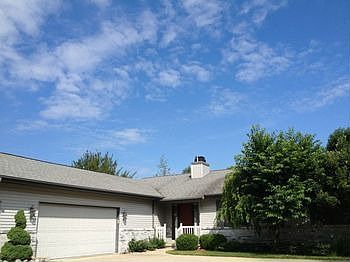 Don't miss this well maintained, lovely 3 bedroom home with 3 full baths within walking distance of Siebert Elementary and Jefferson Middle school. Just a few of many amenities to talk about vaulted ceiling, wood floors from front entry  throughout the kit, nice four season room with private setting great for watching birds,  main floor laundry, large deck with patio door. Large master suite, large 2-12 car attached garage.  There is also 950 sq ft of finished lower level with 2 egress windows & lots of storage room you have to see for yourself! Home has been professionally landscaped!!