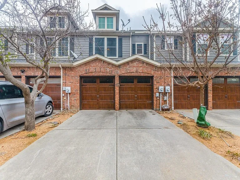 Rear entry 2 car garage with recent doors and openers.