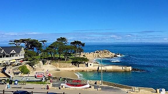 View from both balcony's of Lover's Point. Beach House Restaurant, The Grill, and Adventures By The Sea Water Sports, Bikes, and Surreys