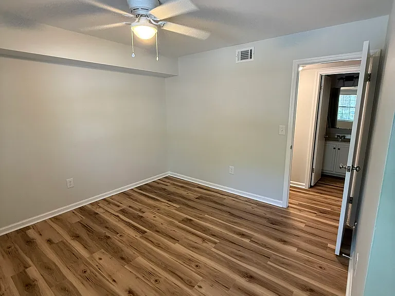 Secondary Bedroom (Secondary Bathroom across Hallway shown)