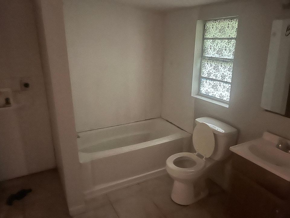 Bathroom with stackable laundry hook ups