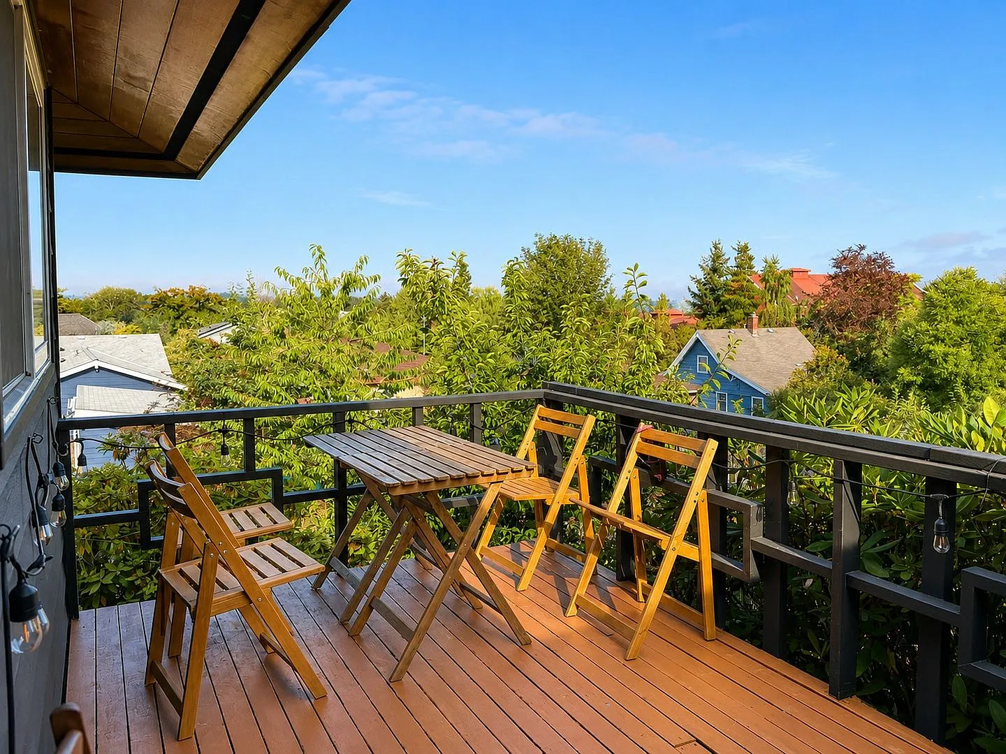 Fully Furnished and Renovated Top-Floor Unit with Prime Olympic Mountain Views Utilities Included  — Photo 3