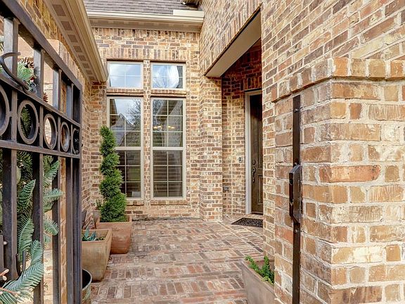 Enter through the private gated courtyard