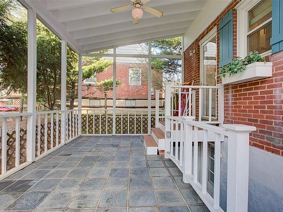 large screened in porch off the kitchen and dining room
