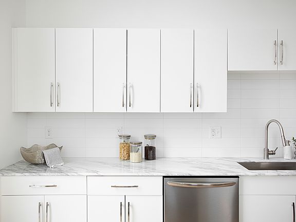 Brazilian Calacatta Countertops Custom Cabinetry