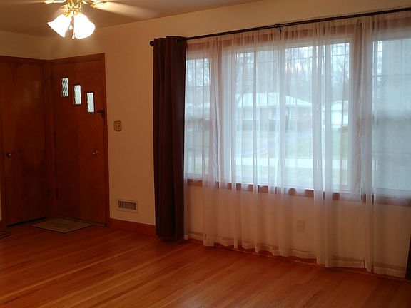 Family Room - Picture Window - Front Door - Closet
