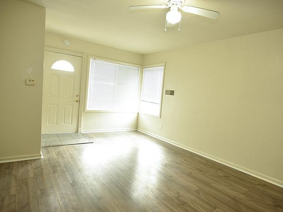 living room, another view. shown entry door