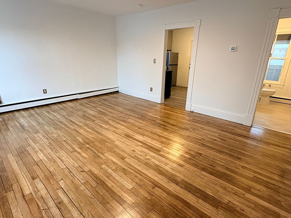 Living Room, with doors to Kitchen and Bathroom