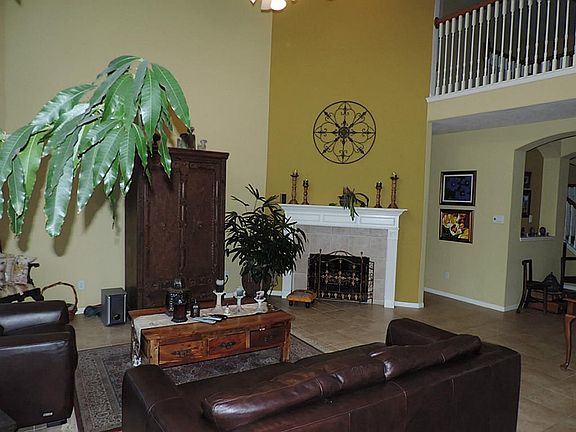 Another View of the 2-Story den with corner fireplace!