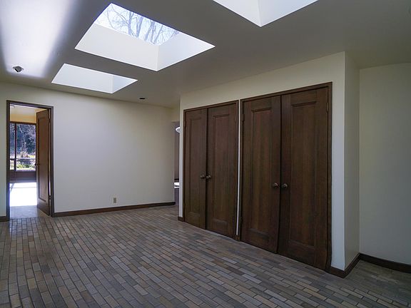 New skylights. Original tile entry. Refreshed wood and new paint.