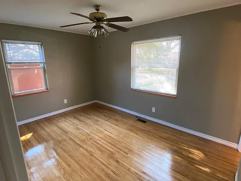 Master bedroom, shades included, brand new fan.