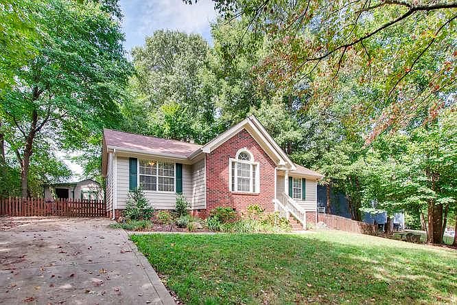 Partial Brick, Single Story home on Large wooded lot.