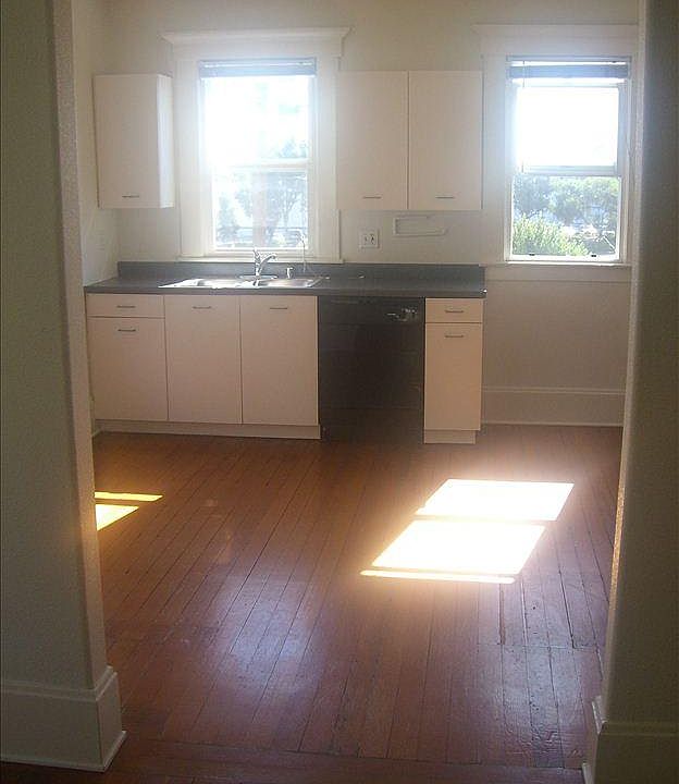 Full kitchen with dishwasher.