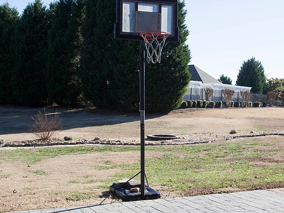 WIDTH OF BACKYARD IS PAVED