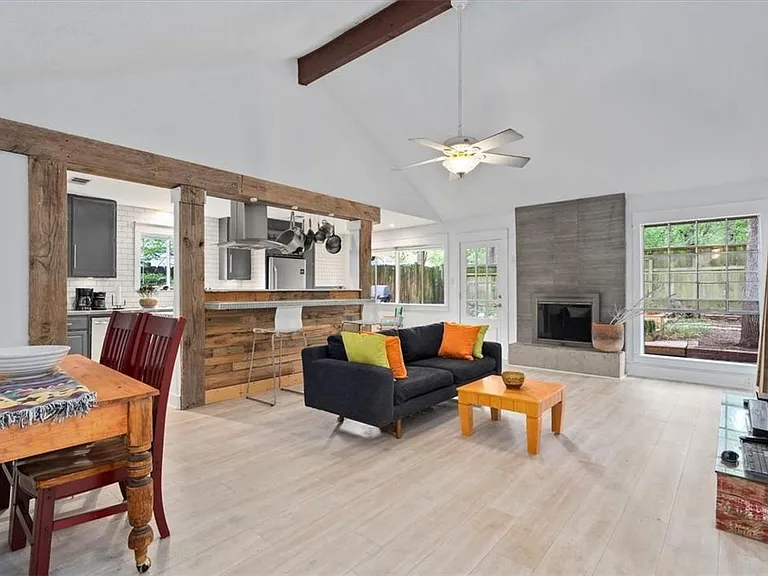 Living room with Open Kitchen and Fireplace