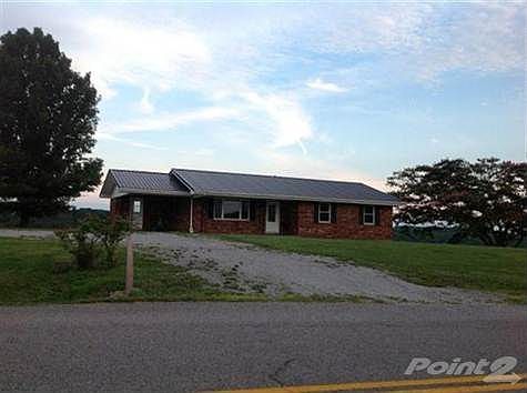 <B>Newer metal roof, furnace, AC, & water heater; new carpeting; beautifully remodeled kitchen; plus lots of updates.<br>