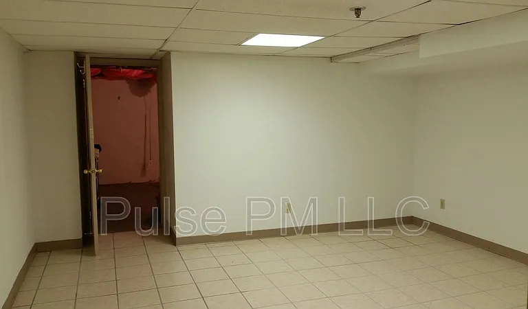 112 E 5th St #LOWER LEVEL — Photo 9