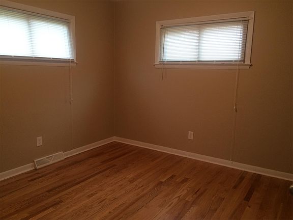 hardwood floors in main level master bedroom