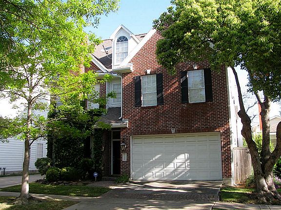 FRONT. Patio Home, 3-story built by Lovett. Living on first floor.