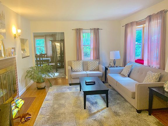 Living room shown with furniture (not furnished)