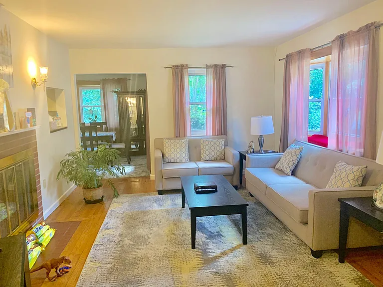 Living room shown with furniture (not furnished)
