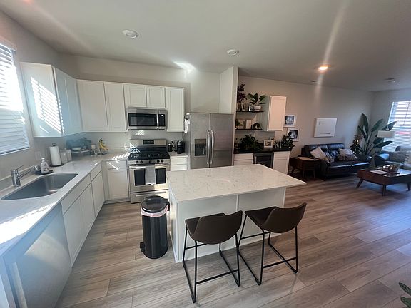 Beautiful quartz countertops with plenty of space to cook.