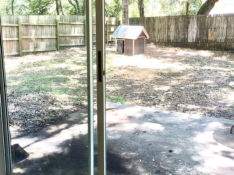 Fenced in Back yard, a new covered roof has been added and the photo will be updated soon.