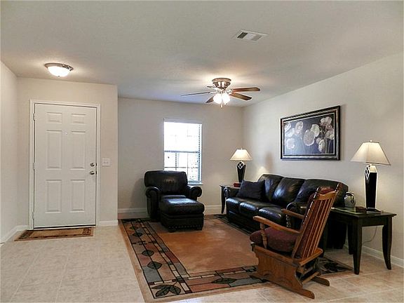 This formal living could be a study or office area.