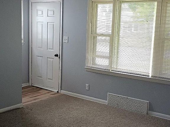 Family Room - freshly painted, new carpeting