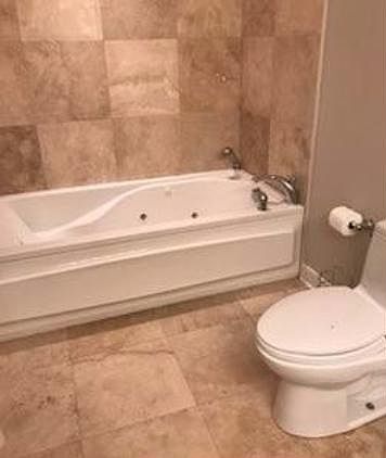 Master bathroom comes with whirlpool tub and shower (shown i