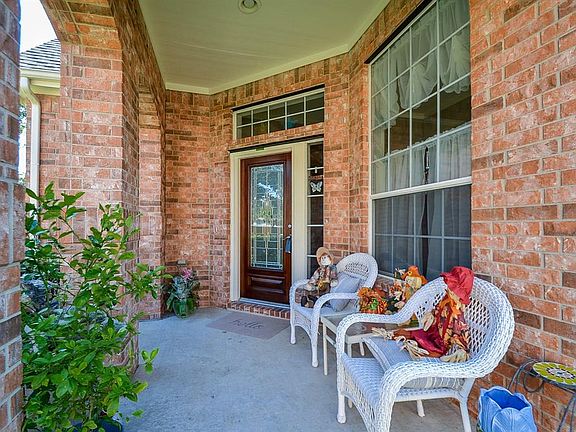 Your covered front porch/main entrance affords privacy, shelter from inclement weather and is roomy enough for home deliveries and happy well-wishers! The amount of space here also easily accomodates seasonal pieces and some very unique "visitors"!