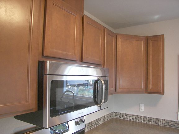 New red birch cabinets