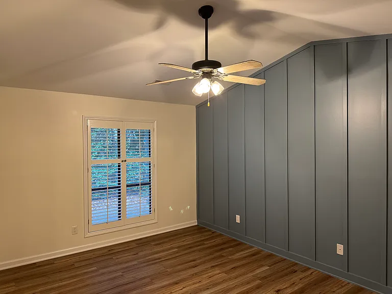 Large master bedroom with cathedral ceiling, walk in closet and ensuite bathroom.