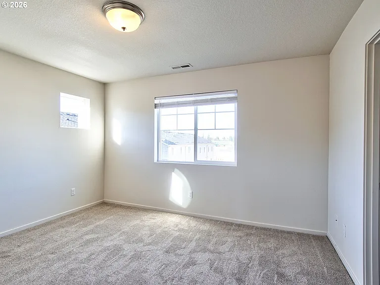 7751 NW Spirea St — Photo 21