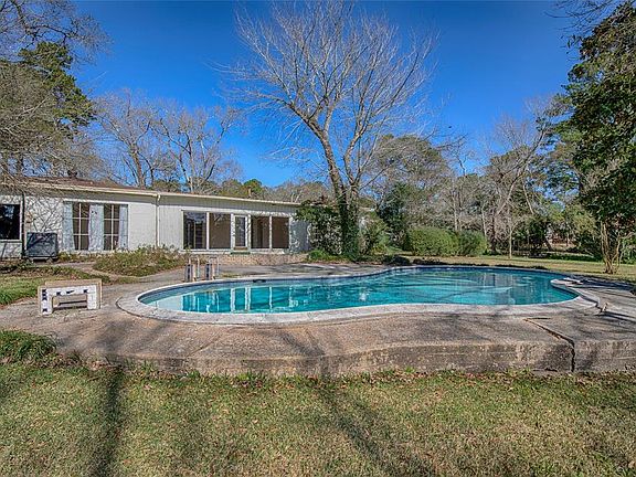 The beautiful pool sits behind the home and is a wonderful place to enjoy the summer.
