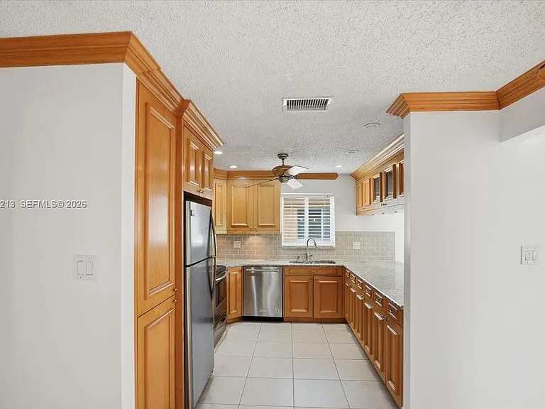 9349 NW 47th St — Photo 16