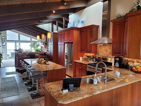Open layout; main level is two bedrooms two full baths. Master has jacuzzi tub.