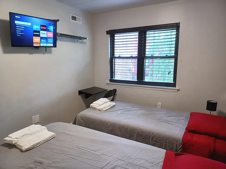 Here is the "second" bedroom, set up with two twin-XL beds. This bedroom could also fit one king or queen bed; without beds, it could nicely serve as an office or study room.